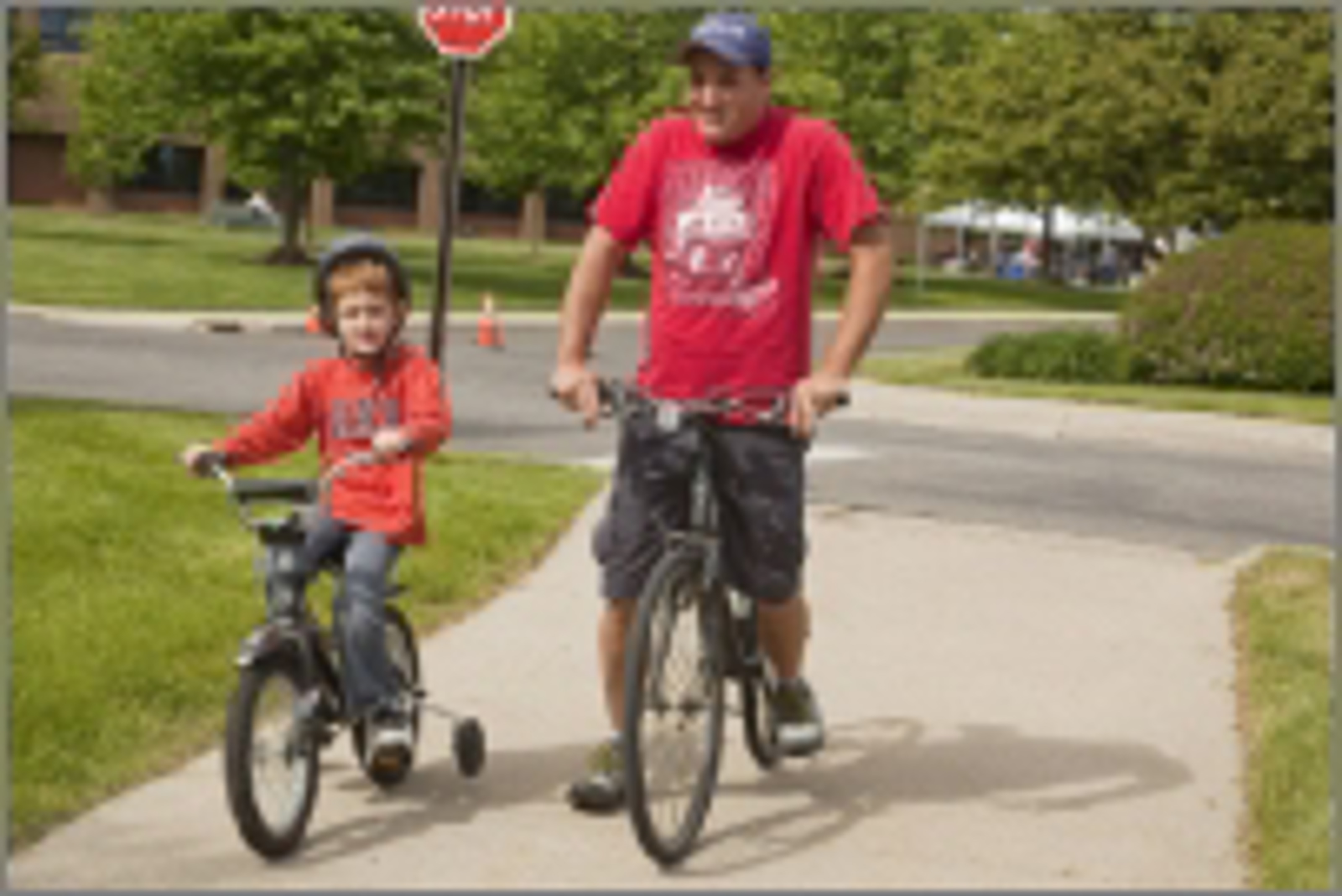 Father and Son Riding Bikes